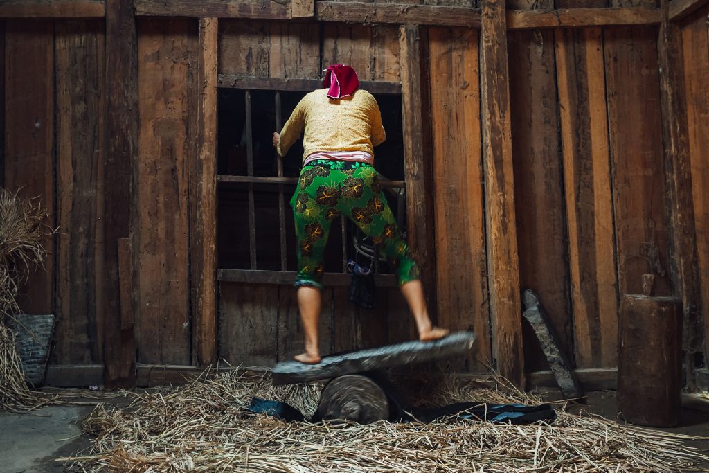 H'Mong woman making linen